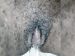 Peeing Beamy Clitoris Around A Wooly Cunt